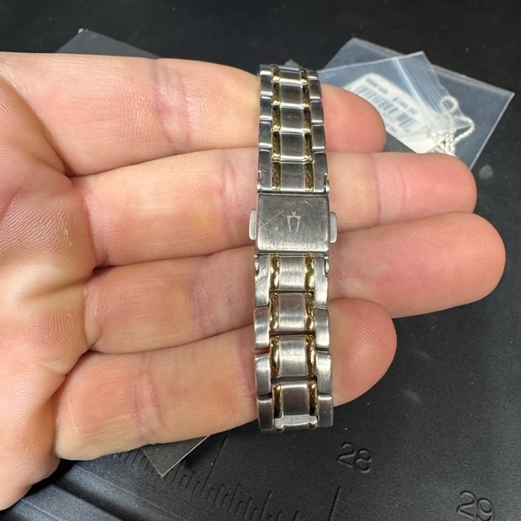 Woman’s Bulova 98M105 2015 Silver and Gold Watch